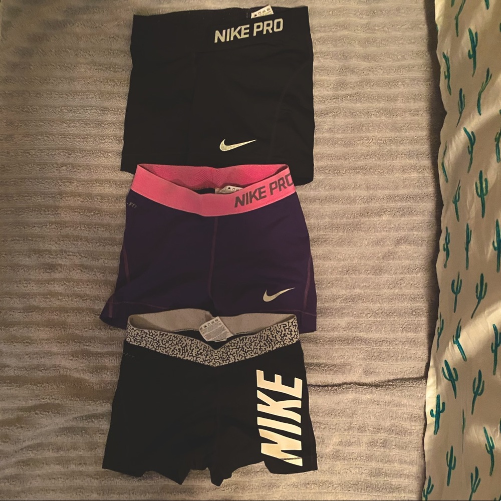Three Pairs Nike Pros